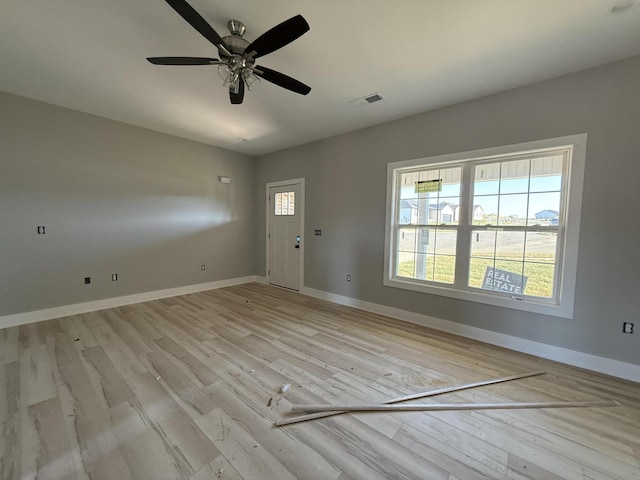 interior space with ceiling fan and light wood-type flooring