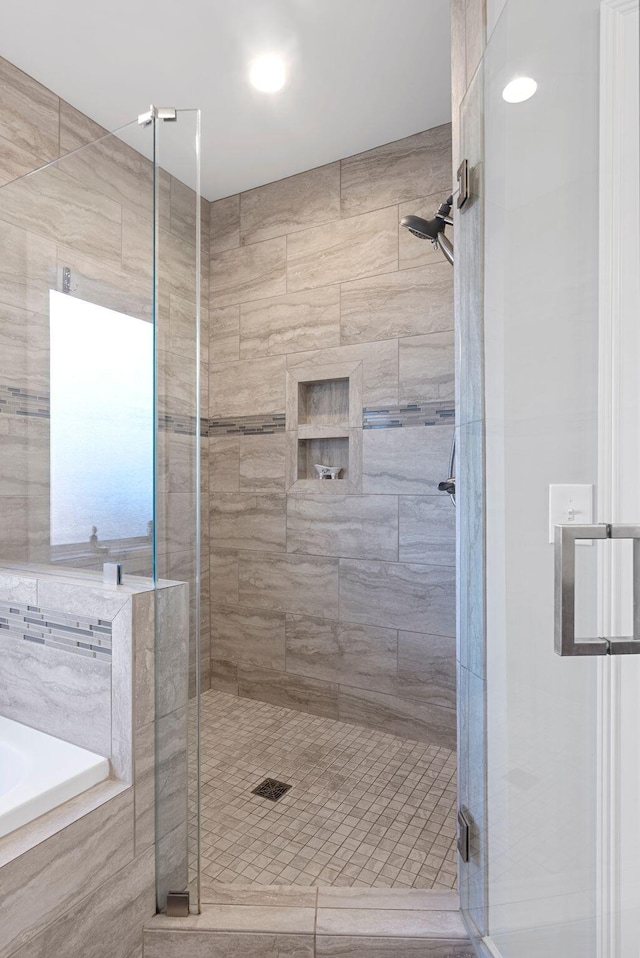 bathroom with independent shower and bath