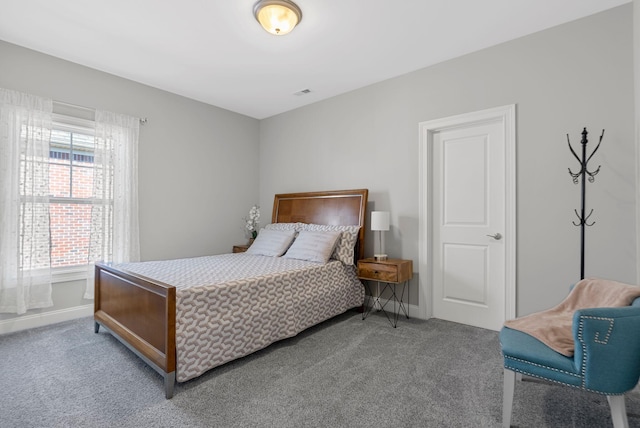 bedroom featuring carpet