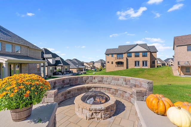 view of patio with a fire pit