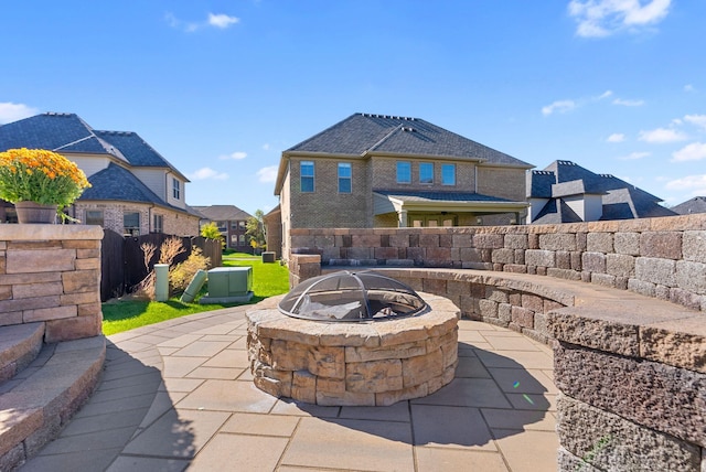 view of patio / terrace featuring a fire pit