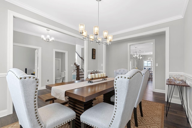 dining area featuring ornamental molding and dark wood-type flooring