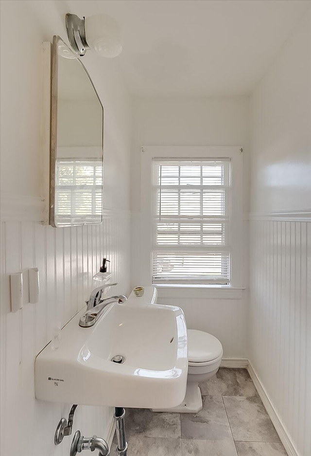 bathroom with sink and toilet