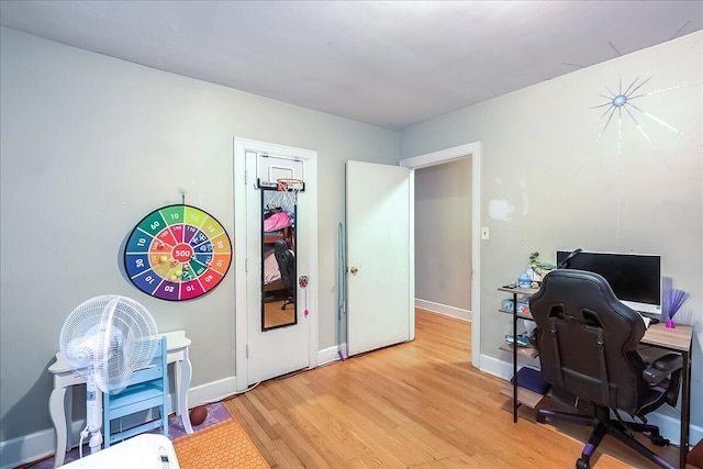 home office featuring light hardwood / wood-style floors