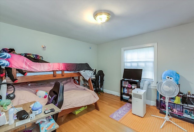 bedroom featuring hardwood / wood-style flooring