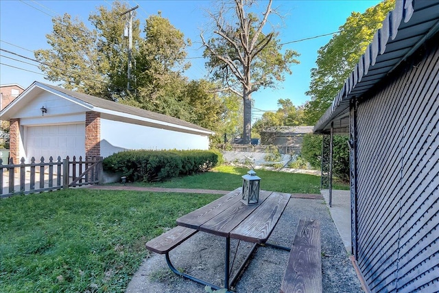 view of yard featuring a garage