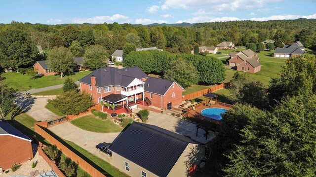 aerial view featuring a forest view