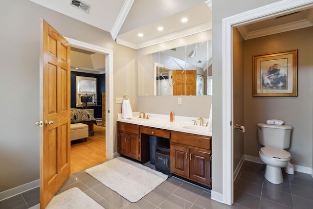 full bathroom with crown molding, tile patterned flooring, visible vents, a sink, and baseboards