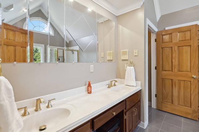 full bathroom with tile patterned flooring, double vanity, a sink, and lofted ceiling