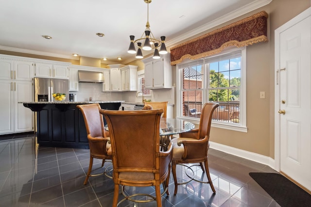 dining area featuring baseboards, a notable chandelier, dark tile patterned floors, crown molding, and recessed lighting