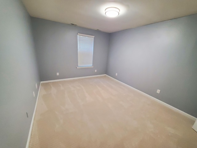 empty room featuring carpet flooring