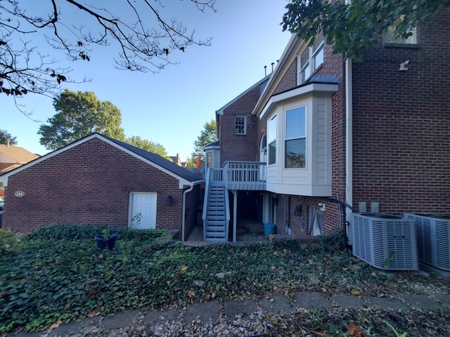 view of property exterior with cooling unit