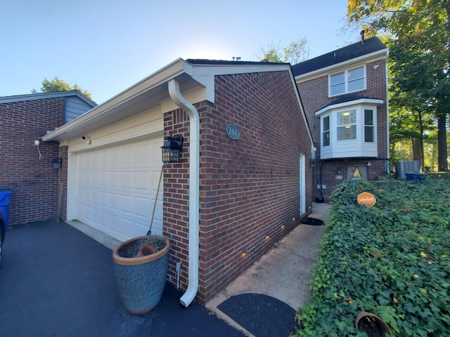 view of home's exterior with a garage