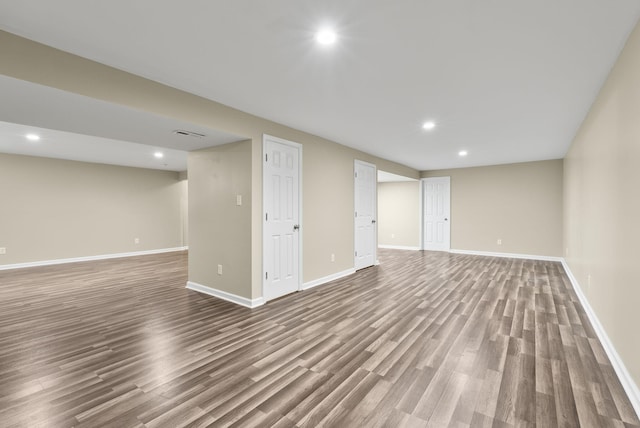 basement featuring hardwood / wood-style flooring