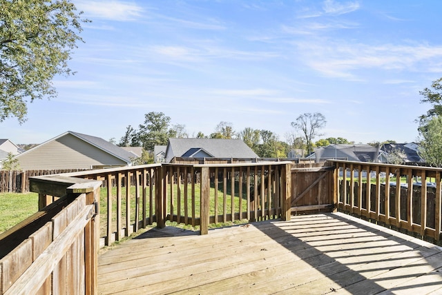 deck featuring a yard