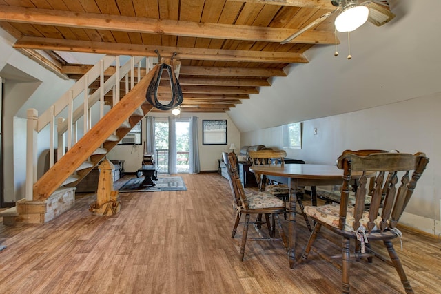 dining room featuring wood-type flooring, wood ceiling, lofted ceiling with beams, and ceiling fan