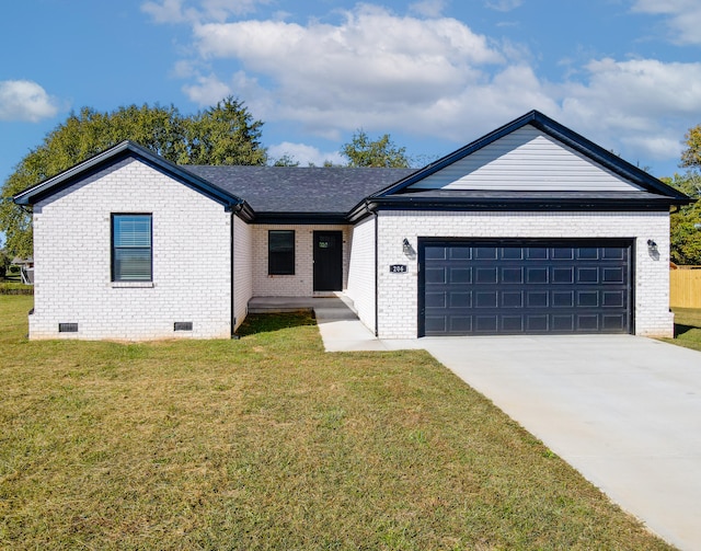 single story home with a front yard and a garage