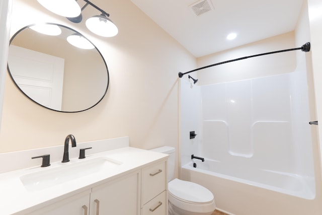 full bathroom featuring shower / bathing tub combination, vanity, and toilet