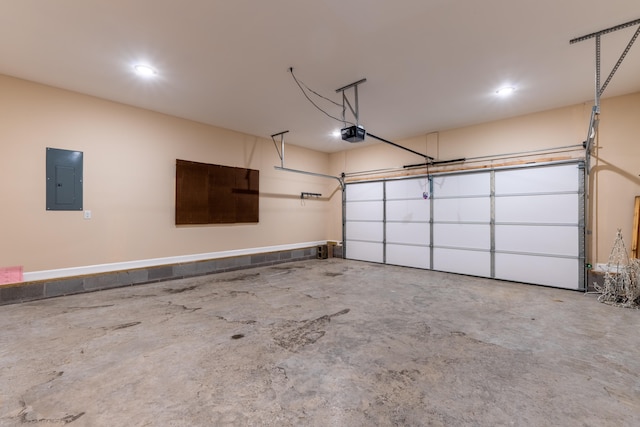 garage featuring a garage door opener and electric panel