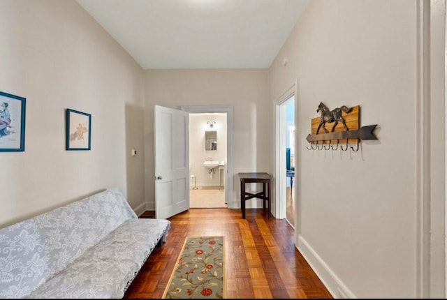 sitting room with parquet flooring