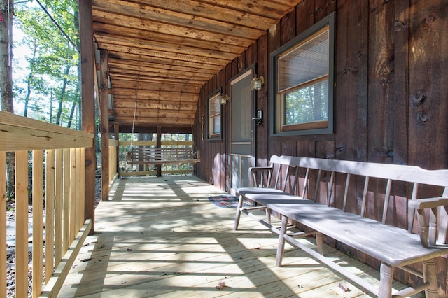 wooden terrace with covered porch