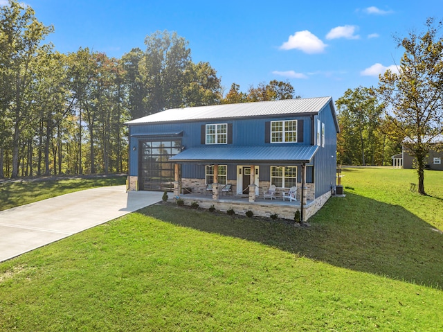 view of front of property with a front lawn and covered porch