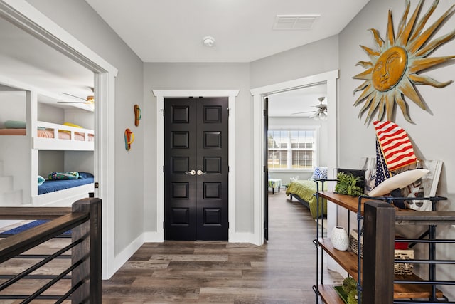 entryway with dark hardwood / wood-style floors