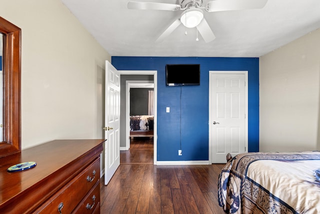 bedroom featuring dark wood-type flooring and ceiling fan