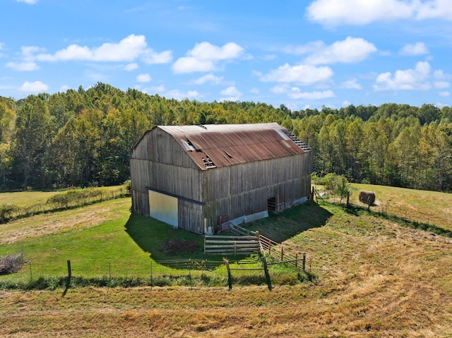 view of outbuilding featuring a rural view