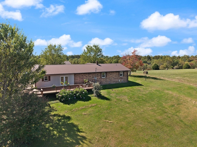 view of yard featuring a wooden deck