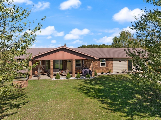 back of house with a yard