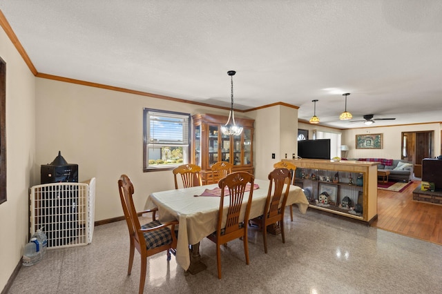 dining area with ceiling fan with notable chandelier, crown molding, hardwood / wood-style floors, and a textured ceiling