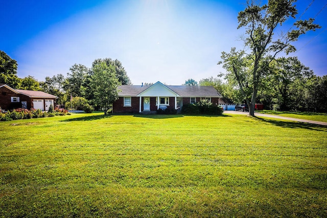 ranch-style home with a front yard