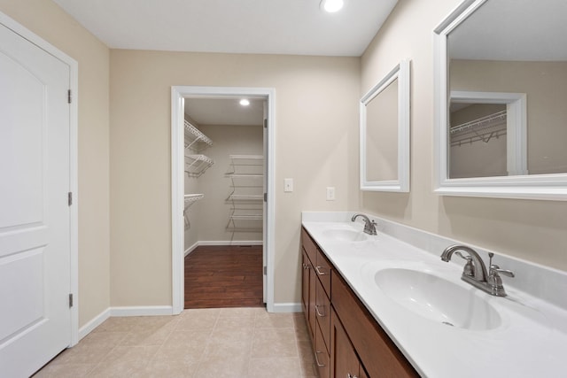 bathroom with vanity and tile patterned floors