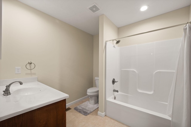 full bathroom featuring tile patterned flooring, shower / bath combination, vanity, and toilet