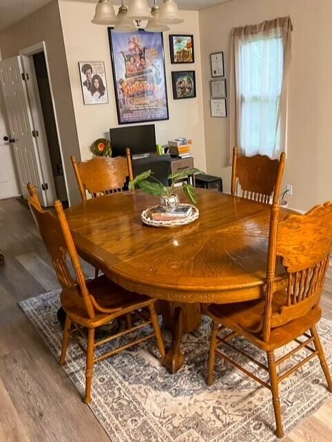 dining area featuring hardwood / wood-style floors