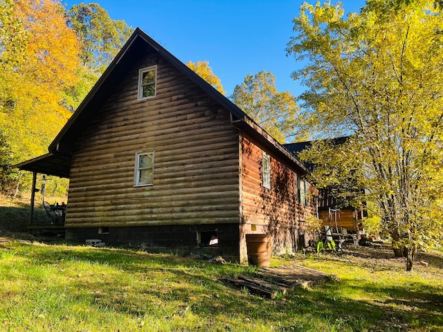 view of property exterior featuring a yard