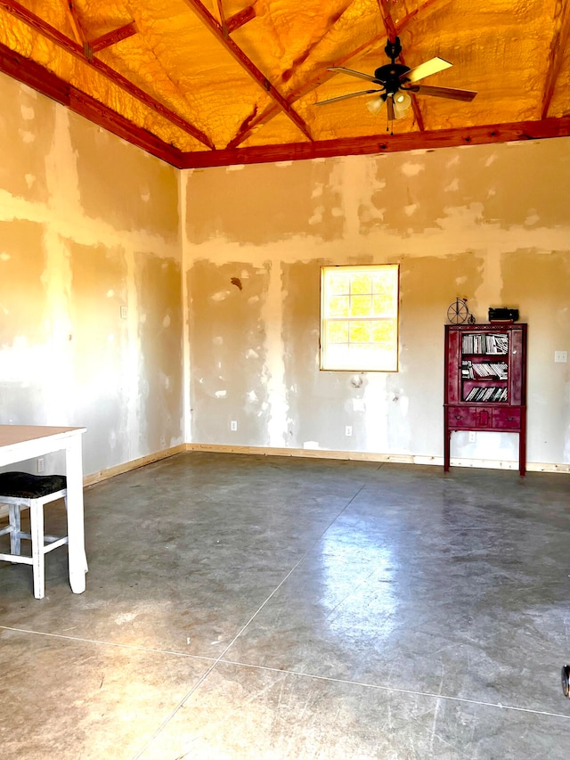 unfurnished room with concrete floors and ceiling fan