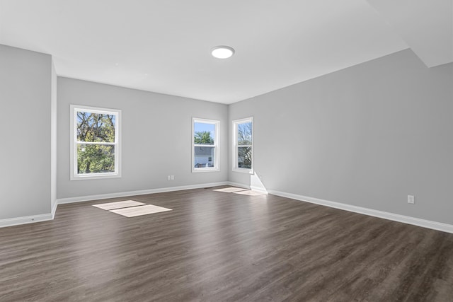 437 Friendly Ave, Nicholasville, KY 40356 - spare room with dark wood-type flooring and baseboards