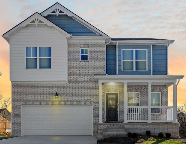 437 Friendly Ave, Nicholasville, KY 40356 - craftsman inspired home featuring covered porch, a garage, and concrete driveway