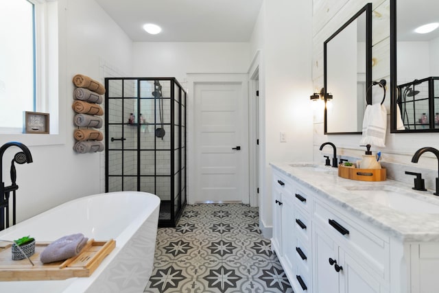 bathroom with vanity, separate shower and tub, and tile patterned floors