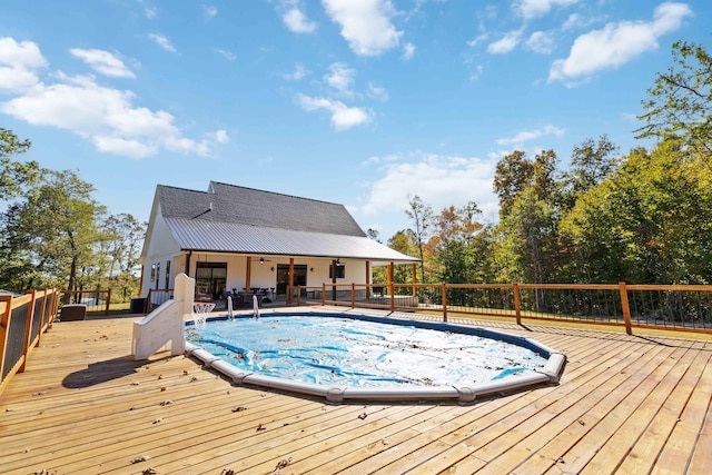 view of pool featuring a deck