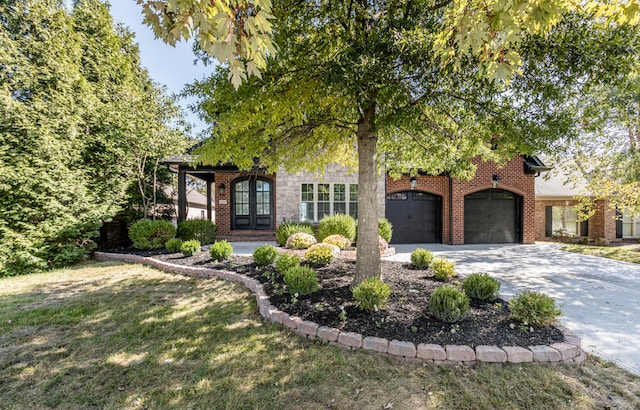 view of front of home featuring french doors, a front lawn, and a garage