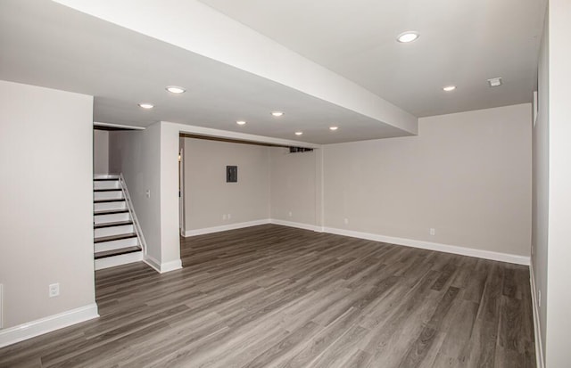 interior space featuring stairs, recessed lighting, wood finished floors, and baseboards