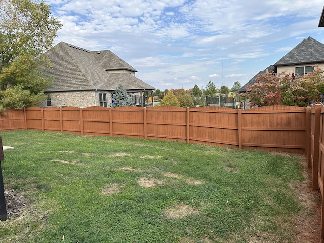 view of yard with fence