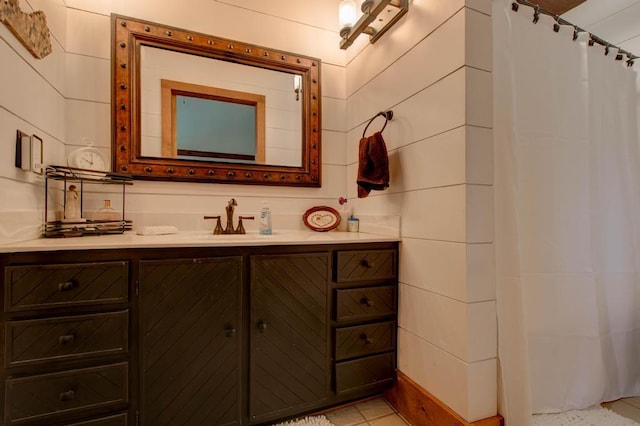 bathroom featuring vanity and a shower with shower curtain