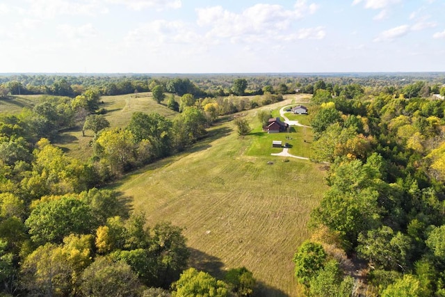 birds eye view of property featuring a rural view