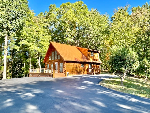 view of front of house with a deck