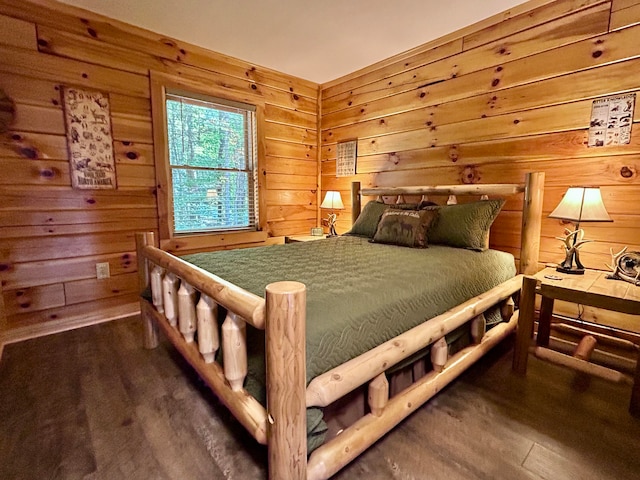 bedroom with wooden walls