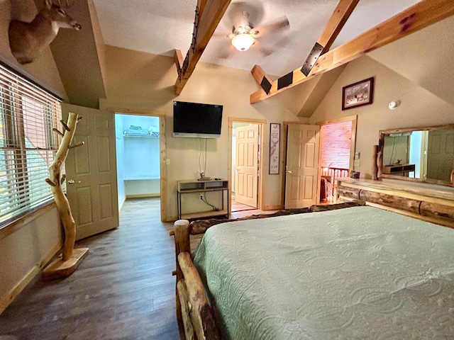 bedroom featuring ceiling fan, high vaulted ceiling, beam ceiling, and wood-type flooring